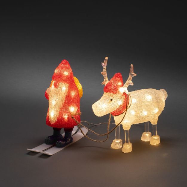 Konstsmide Weihnachtsbeleuchtung - Weihnachtsmann mit Rentier - 23 x 9 x 23,5 cm - IP44 - transparent und rot