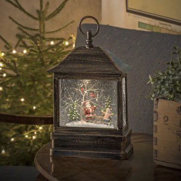 AUSSTELLUNGSSTÜCK - Konstsmide Weihnachtsbeleuchtung - Schneelaterne mit Weihnachtsmann und Kind auf Batterien - 17,5 x 8,5 x 25 cm - braun