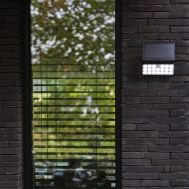 Lutec Tuda - Außen-Solar-Wandleuchte mit Bewegungsmelder - intelligente Beleuchtung - Lutec Connect - 18 x 11,1 x 19,2 cm - 8,5W LED inkl. - IP44 - schwarz